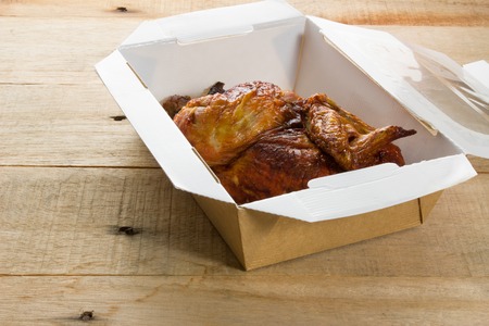 Roast Chicken on Wooden Backgroundの写真素材