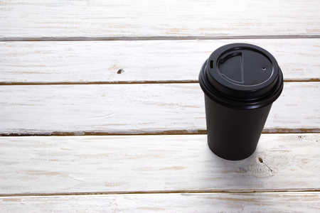 Paper Cup on Wooden Backgroundの写真素材