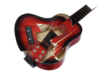 Broken Guitar on White Backgroundの写真素材