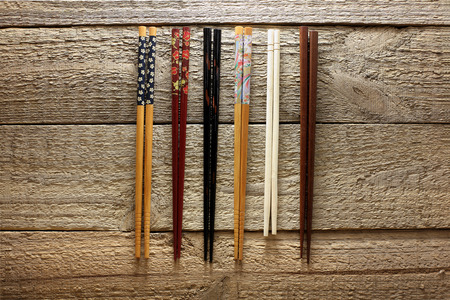 Chopsticks on Wooden Backgroundの写真素材