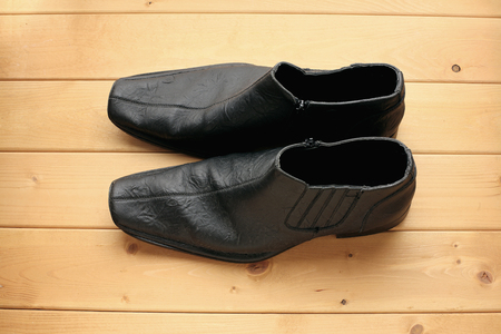 Boots on Wooden Backgroundの写真素材