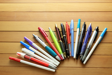Ballpoint Pens on Wooden Backgroundの写真素材