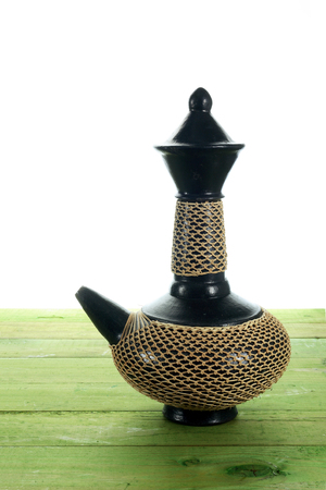 Arabic Coffee Pot on Wooden Backgroundの写真素材