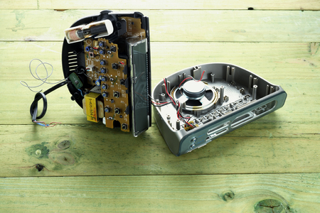 Broken clock Radio on Wooden Backgroundの写真素材