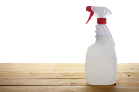 Spray Bottle on Wooden Backgroundの写真素材