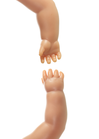 Doll Hands on White Backgroundの写真素材