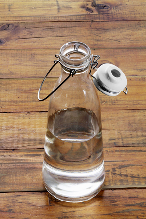 Water Bottle on Wooden Backgroundの写真素材