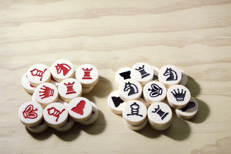 Chess Pieces on Wooden Backgroundの写真素材