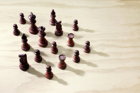 Chess Pieces on Wooden Backgroundの写真素材