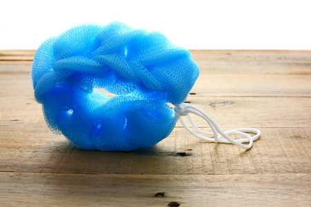 Body Scrubber on Wooden Backgroundの写真素材