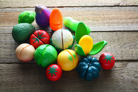 Toy Vegetables on Wooden Backgroundの写真素材