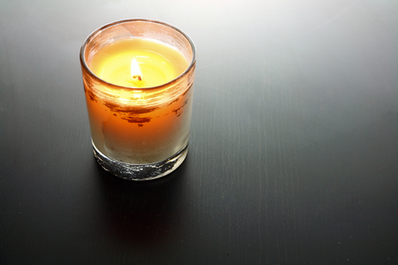 Scented Candle on Wooden Backgroundの写真素材