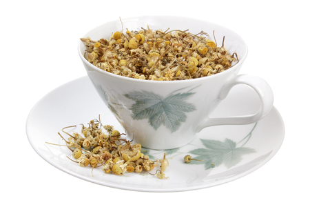 Cup and Chamomile Tea on White Backgroundの写真素材
