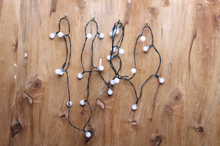 Fairy Lights with Wooden Backgroundの写真素材