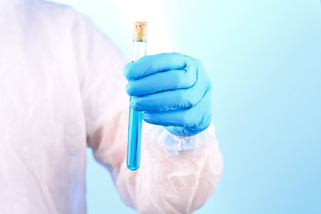Chemical laboratory preparation in the form of blue liquid in a test tube.の写真素材