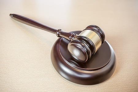 ] Wooden judges gavel on table,legal concept
