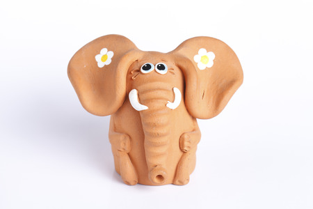 elephant figurine isolated on white backgroundの写真素材