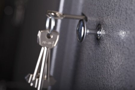the keys in the keyhole closeupの写真素材
