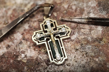 Zaporozhye , Ukraine  5  February , 2015 : master jeweler Melnikov makes productsのeditorial素材