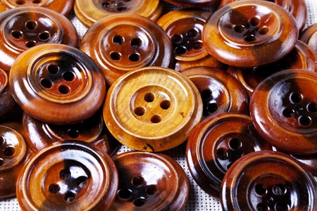a Vintage wooden buttons background