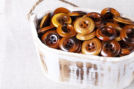 a Vintage wooden buttons backgroundの写真素材