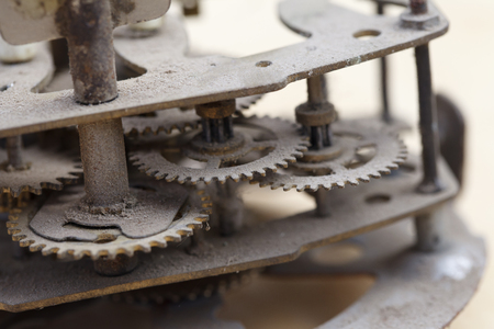 Old clockwork close-up, vintage background of dusty mechanism