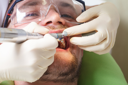 dentistry, patient examination and treatment at the dentistの写真素材
