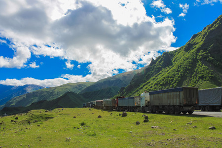trucks on Georgian military roadの写真素材