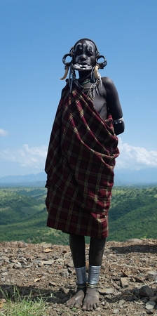 Mursi tribe woman - 05 october 2012 , Omo valley, Ethiopiaのeditorial素材