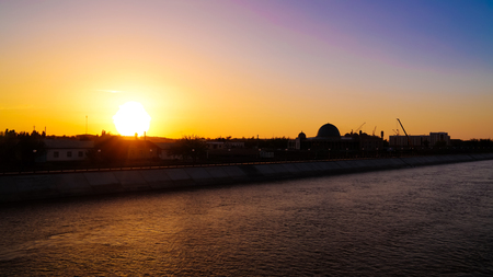 Sunset over Kyzketken channel at Nukus, Karakalpakstan, Uzbekistanの写真素材