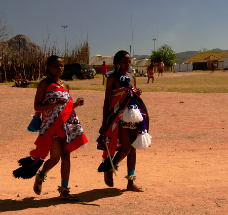 Women in traditional costumes before the Umhlanga aka Reed Dance ceremony - 01-09-2013 Lobamba, Swazilandのeditorial素材