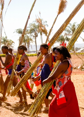 Women in traditional costumes marching at the Umhlanga aka Reed Dance ceremony - 01-09-2013 Lobamba, Swazilandのeditorial素材
