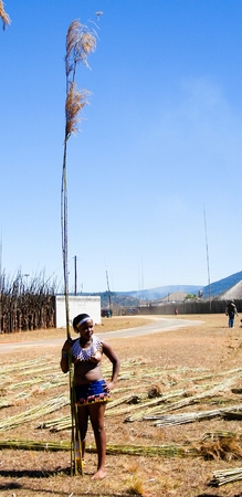 Women in traditional costumes marching at the Umhlanga aka Reed Dance ceremony - 01-09-2013 Lobamba, Swazilandのeditorial素材