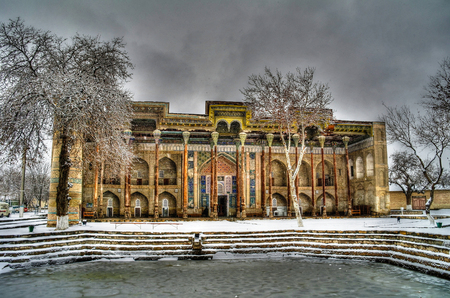 Exterior view to Bolo Hauz Mosque and minaret at Bukhara, uzbekistanの写真素材