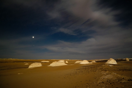 Night photography of the Abstract nature rock formations aka sculptures in White desert at Sahara, Egyptの写真素材