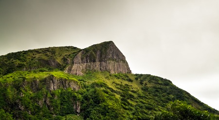 panoramic view to Rocha dos Bordoes aka Catchphrases cliff, Flores, Azores, Portugalの写真素材