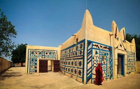 Exterior view to Dosso sultan residence and portrait of sultans guard in national uniform 30 september 2017 Dosso, Nigerのeditorial素材