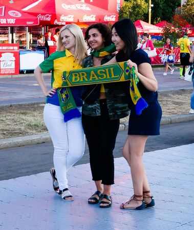 Brazilian Football fans in the FIFA fan fest at Sparrow Hills aka Vorobyovy Gory in Moscow at FIFA football world cup - 27 June 2018, Moscow, Russiaのeditorial素材