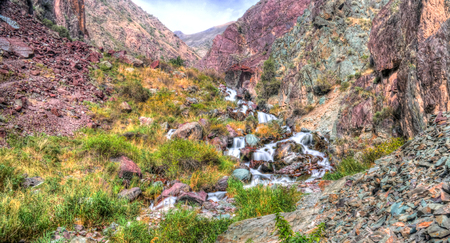 Small waterfall to Too-Ashuu pass and Kara Balta river and valley at Chuy Region of Kyrgyzstanの写真素材