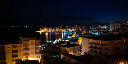 night Aerial Panoramic view to Saranda city and bay of Ionian sea in Albaniaのeditorial素材