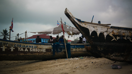Panoramic view to Accra beach with the fishermans boat in Ghanaのeditorial素材