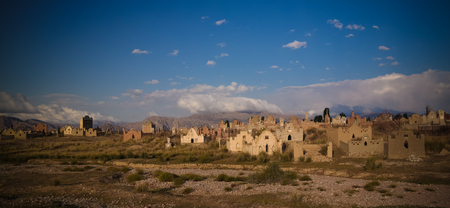 Panorama view to muslim cemetery Semiz Bel at sunset at Kochkor in Naryn region , Kyrgyzstanの写真素材