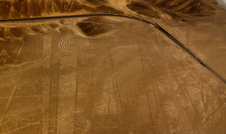 Aerial airplane panoramic view to Nazca geoglyph lines aka spiral, Ica region, Peruの写真素材