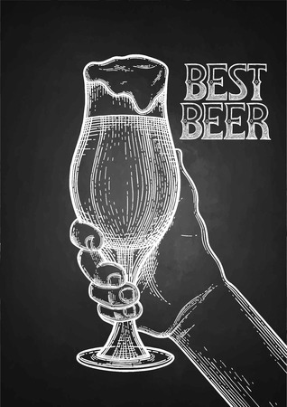 Graphic hand holding pint of beer. Vintage vector illustration isolated on the blackboard background drawn in engraving techniqueのイラスト素材
