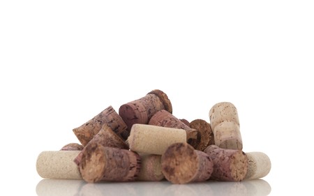 Corks from bottles guilt isolated white background.の写真素材