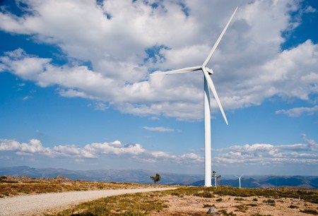 Beautiful meadow with Wind turbines generating electricity.の写真素材
