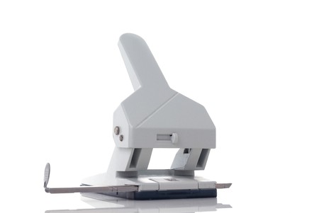 White hole puncher  isolated on white background.の写真素材