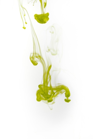 Green ink splash flowing in water isolated on white background.の写真素材