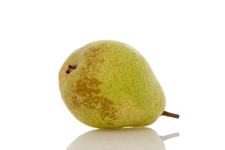 Pear lying on a reflective shiny white background.の写真素材