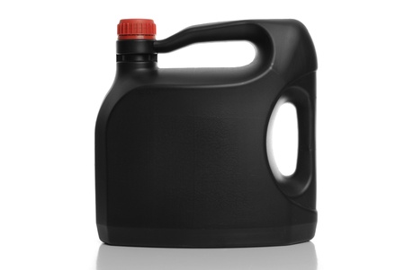 Black plastic bottle red cap on white background.の写真素材